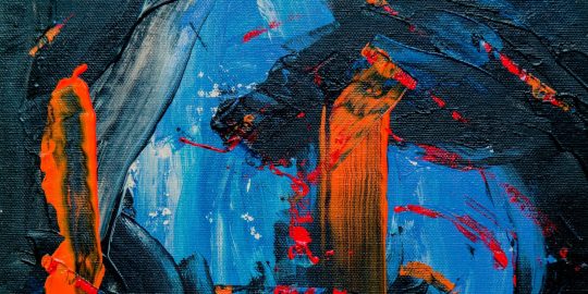 blue, black, and orange abstract painting