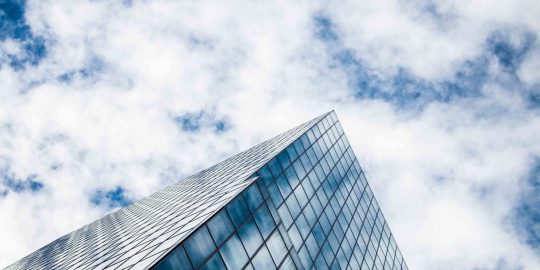 gray concrete building under blue sky
