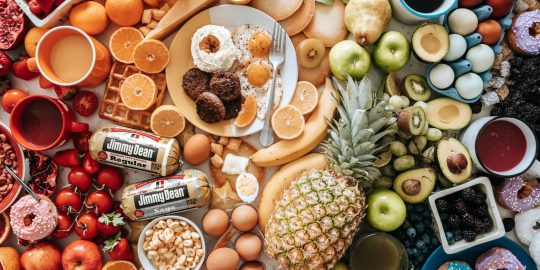 assorted fruits on brown wooden bowls